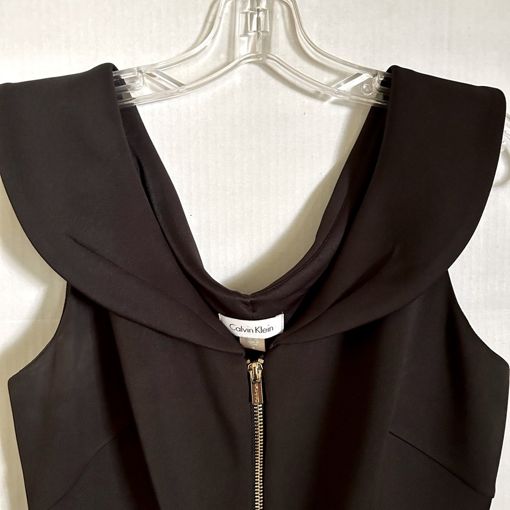 Calvin Klein black dress size 4…fits like a 6. New